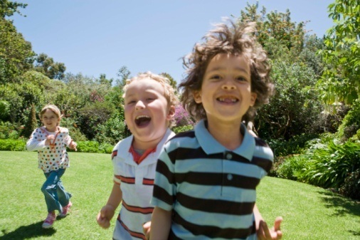 Children playing in field