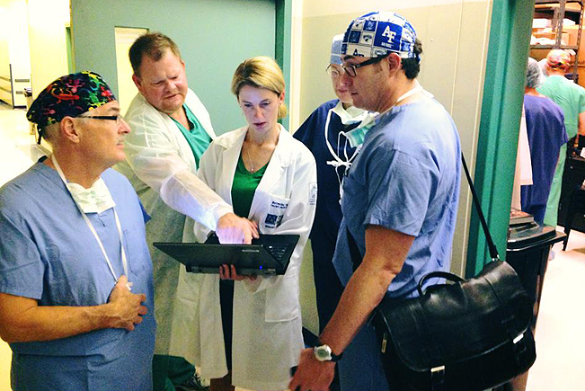 doctors looking at computer