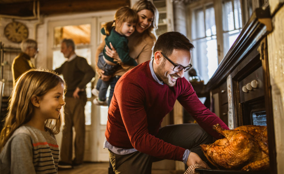 family looking at turkey
