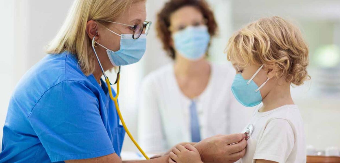 Nurse with a stethoscope on a boy